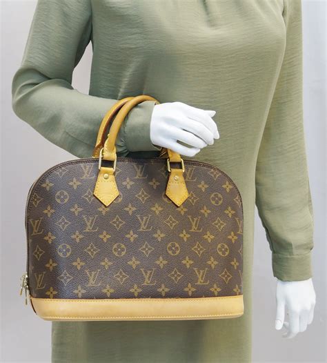 louis vuitton alma satchel cheap|louis vuitton pre owned bags.